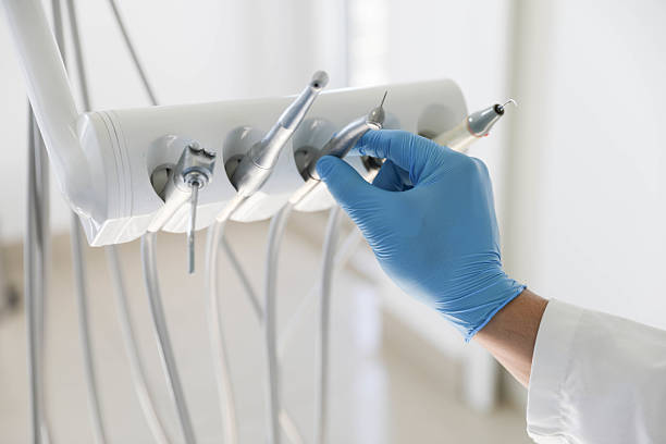 Professional Tooth Extraction technician working in Albertson, NY